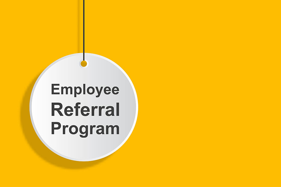 Employee Referral Program printed on white circle on bright yellow background