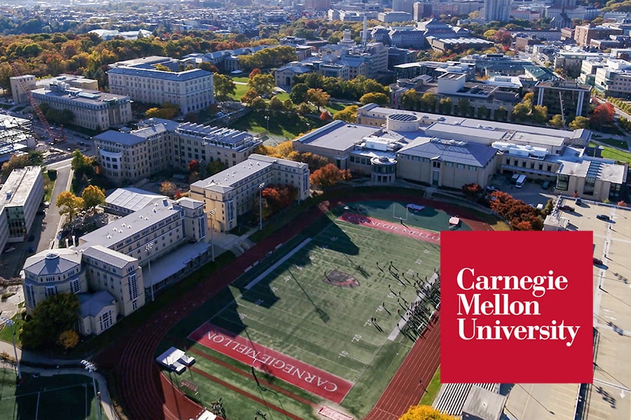 Aerial view of campus overlaid with CMU wordmark