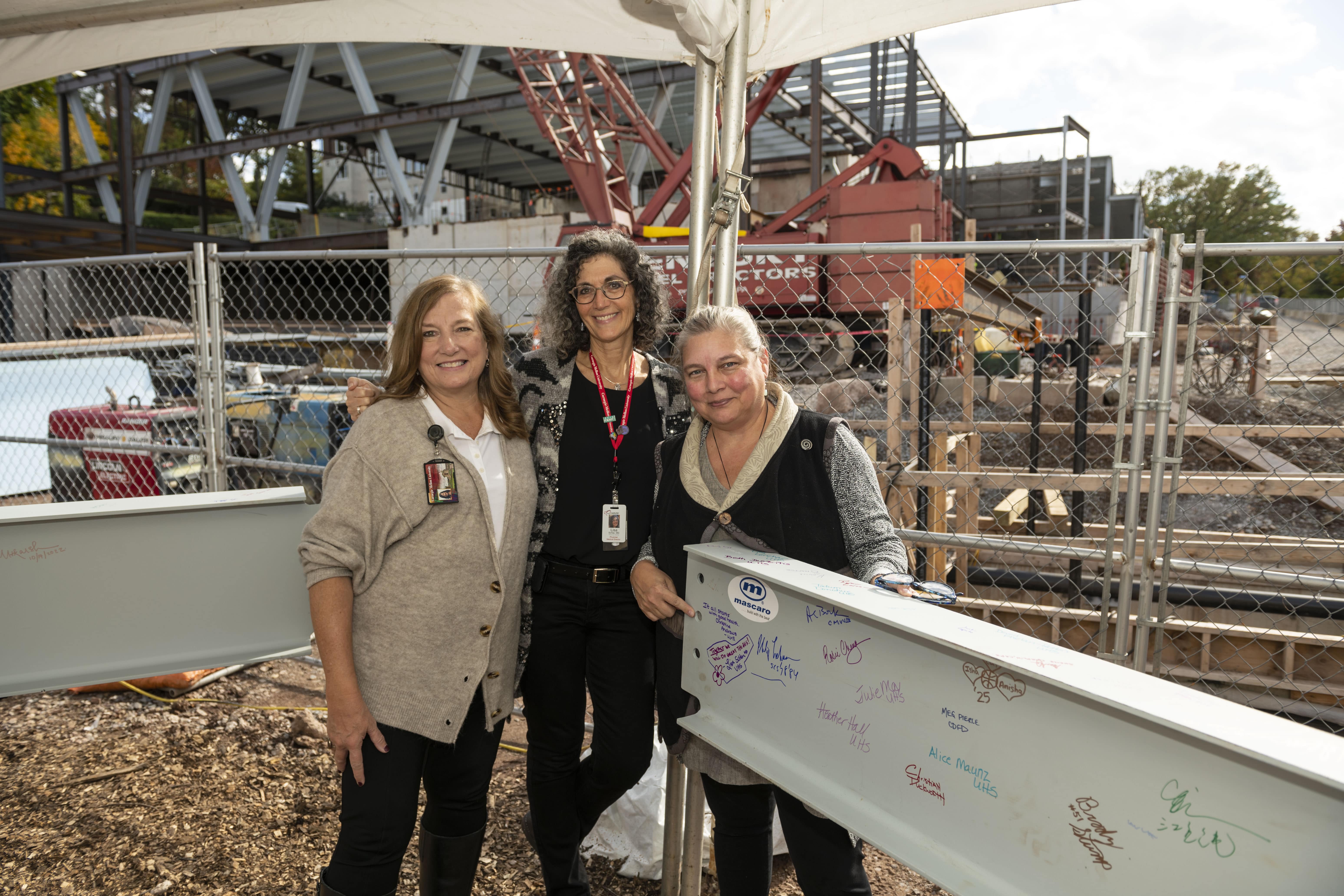 Community members at beam signing