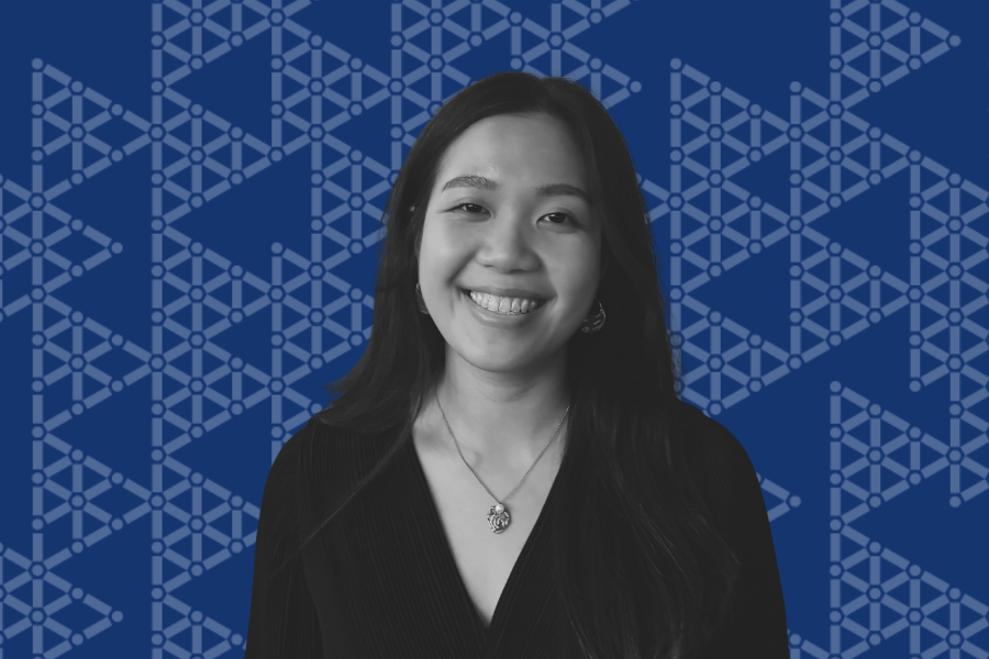 Julia's Headshot in front of iii background