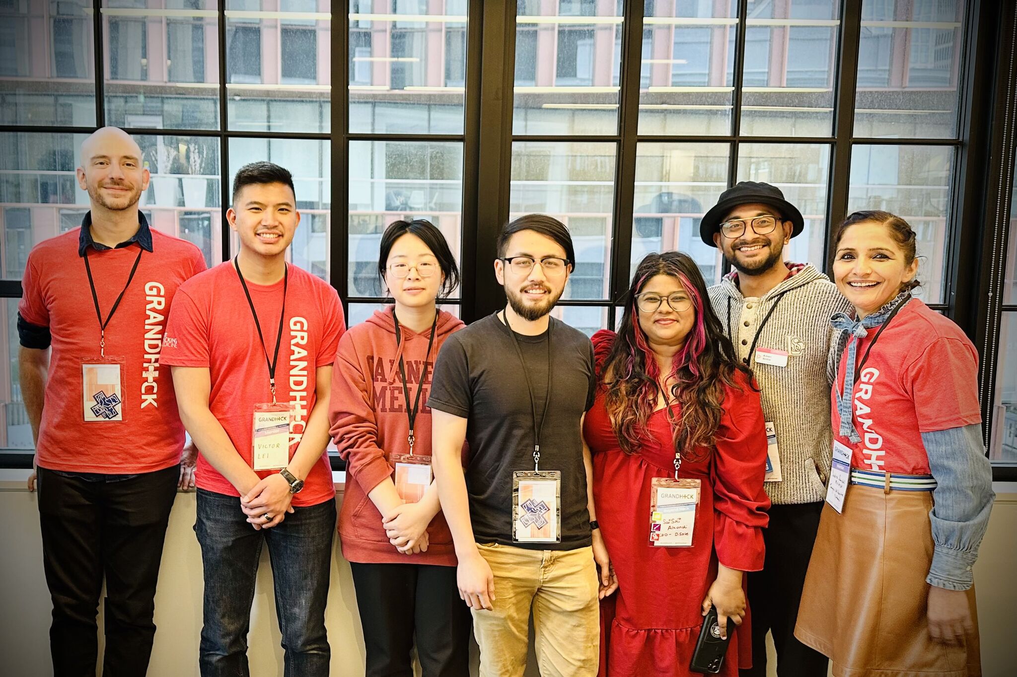 Seven students pose for a picture at the MIT GrandHack event. 