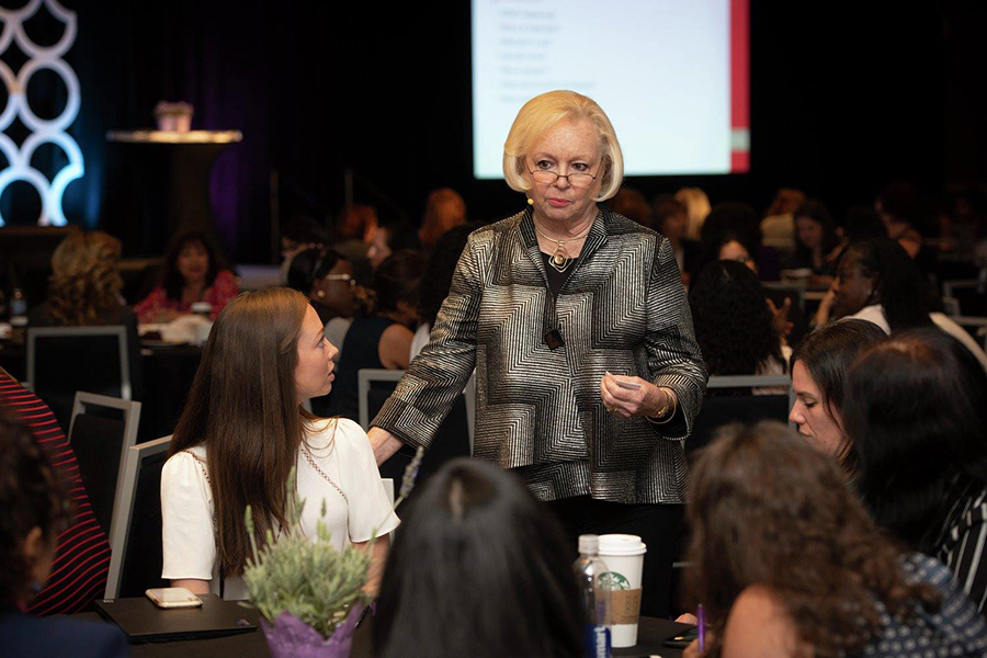 Sheryl Root talks with WITI attendees