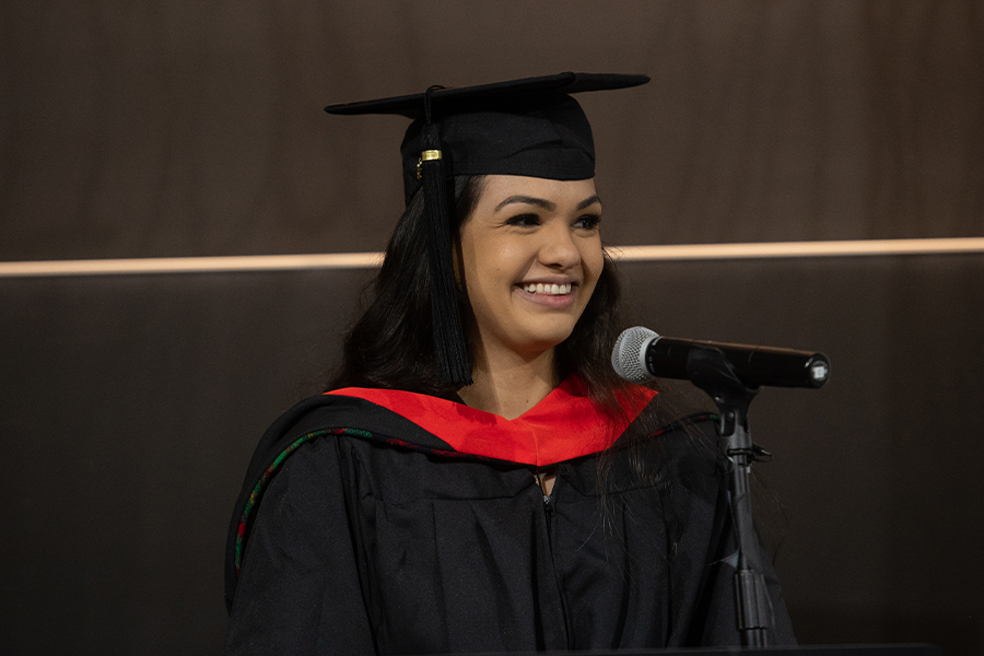 student speaking at podium