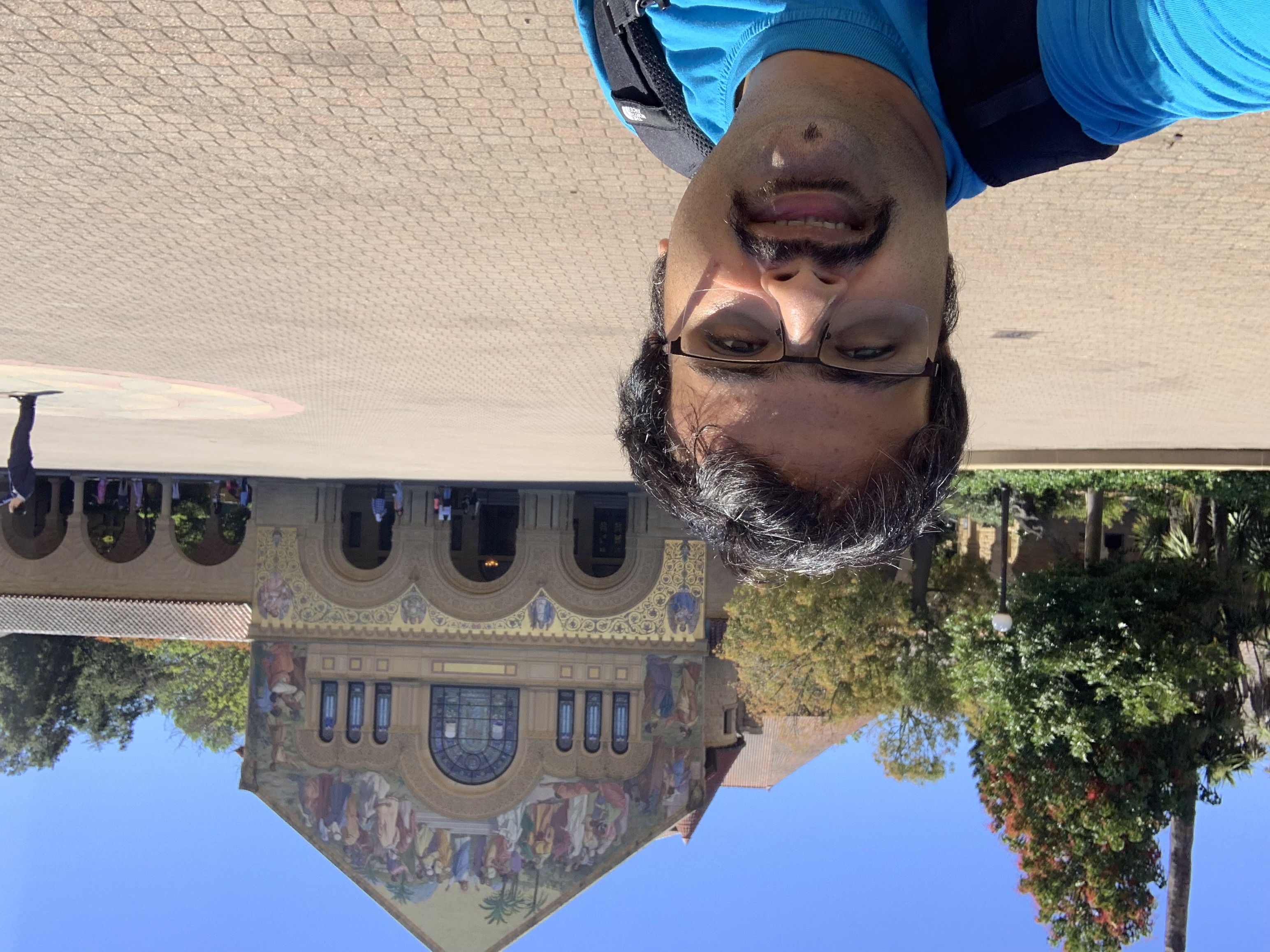 student sarvesh karkhanis takes a selfie on Stanford University's campus