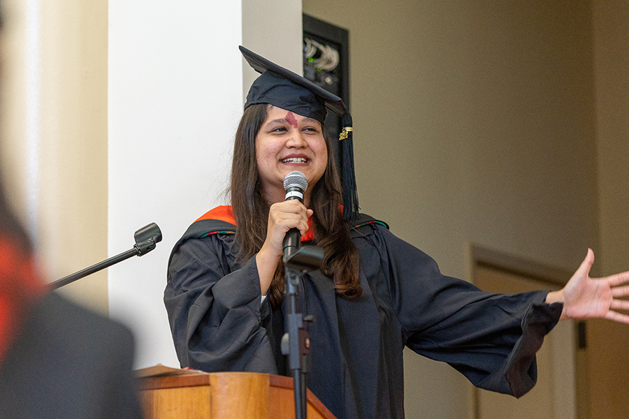 Shivani Jakhmola speaks to the audience from the podium