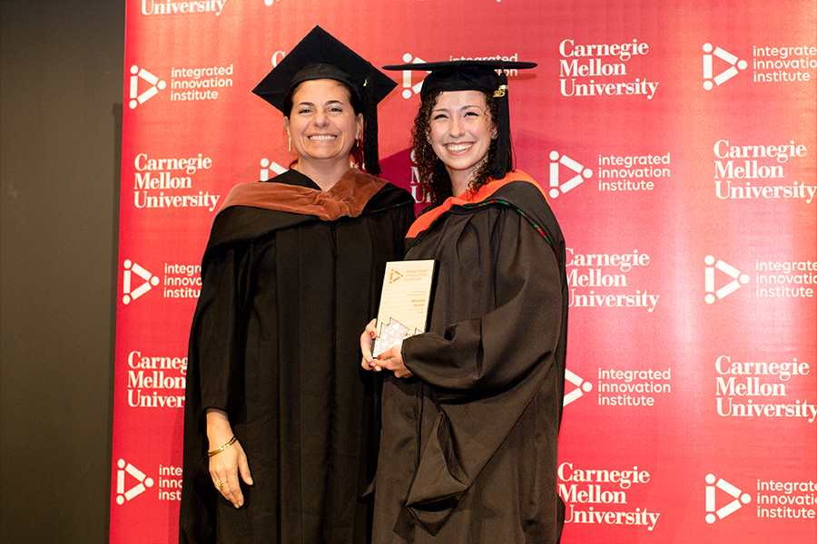 MIIPS Program Director Ellen Ayoob presents Megan Dado with her award