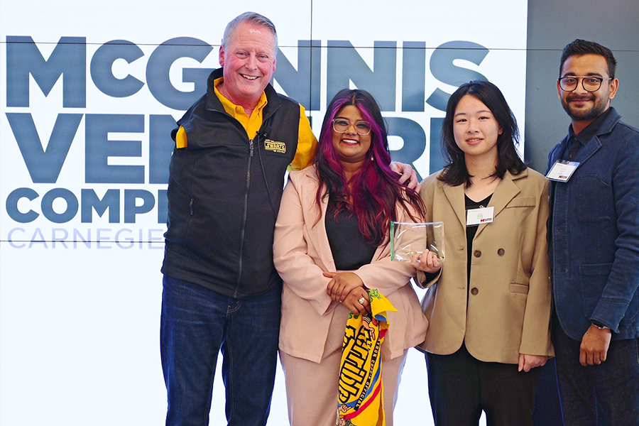 The McGinnis Venture Competition Team poses for a photo with Dave Mawhinney, executive director of the Swartz Center for Entrepreneurship