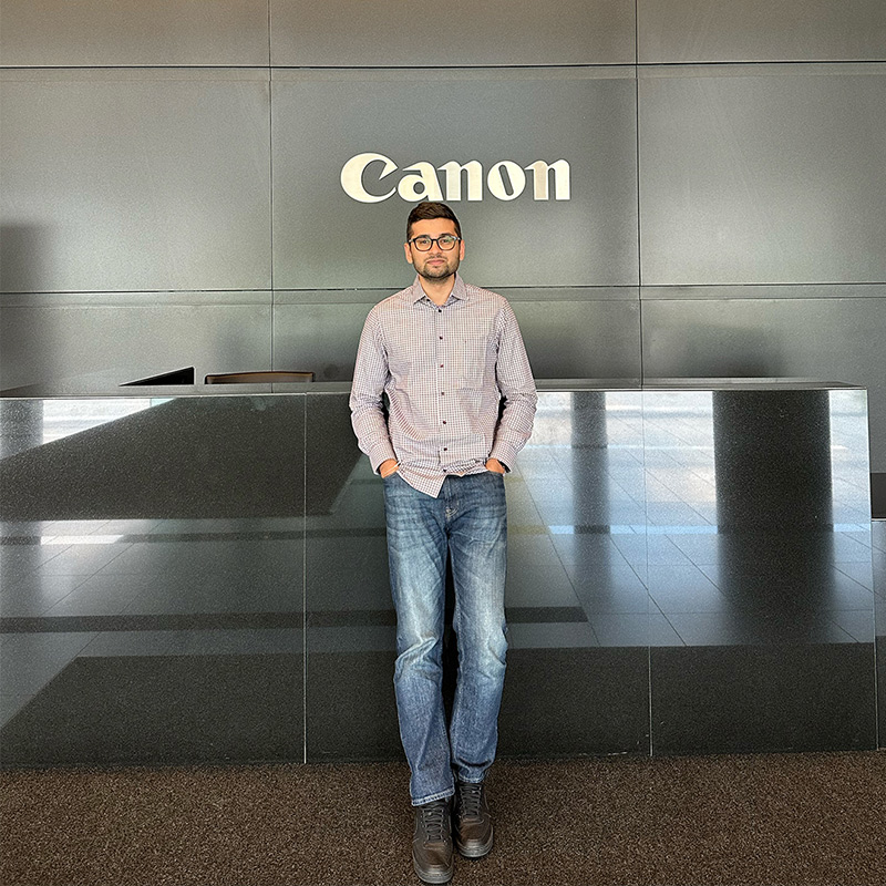 Mahir poses at the Canon offices