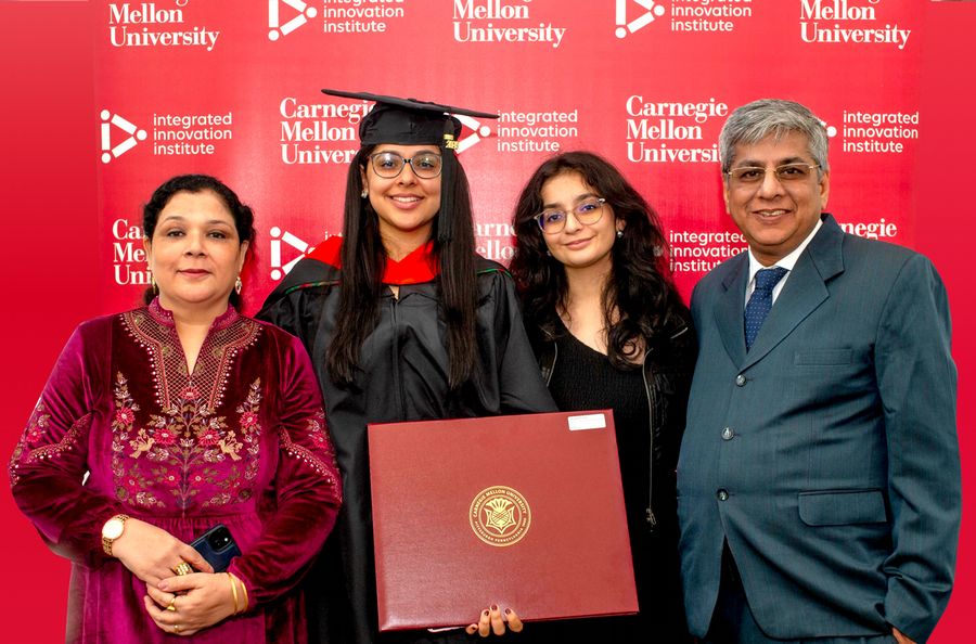 Rhythm with her family at the MIIPS graduation
