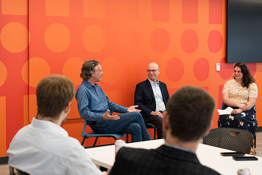 Brad Dietrich and Jim Rooney share professional perspectives with online MIIPS students during a panel discussion.