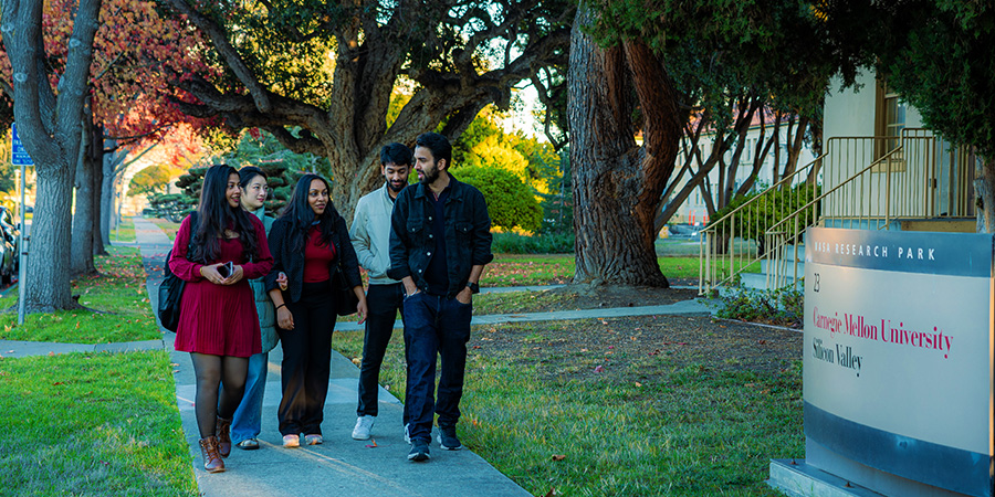 students walking around the silicon valley campus