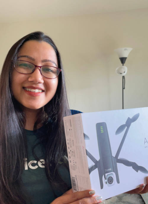 madhu borah holding a drone from service now