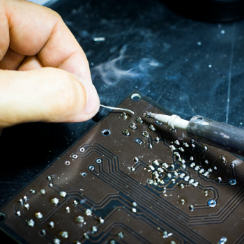 soldering circuits on a circuit board