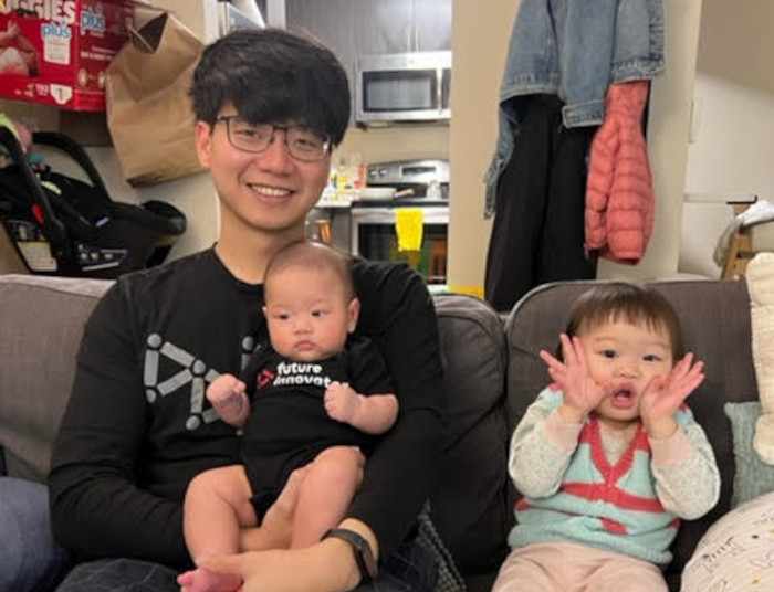 Jerry Lou with his two daughters