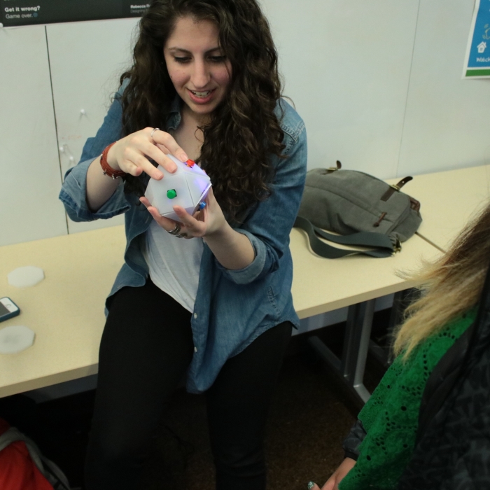 a student working with their project in hand