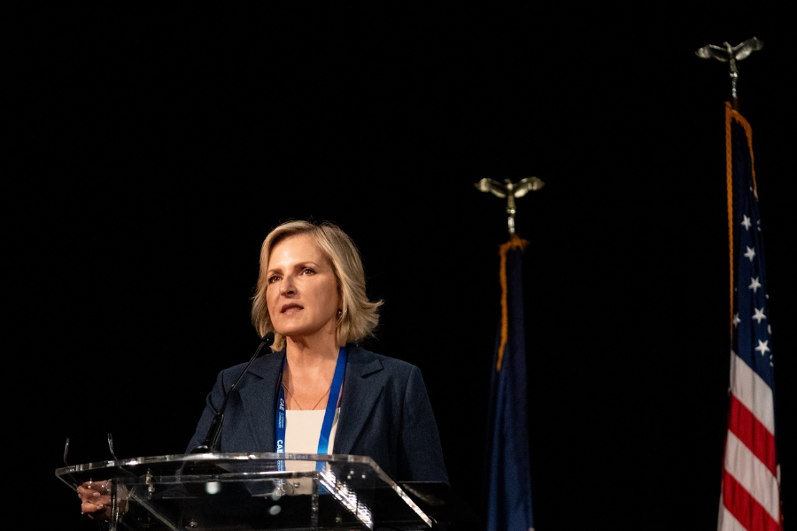 INI Director Dena Haritos Tsamitis speaking at CAE Community Symposium