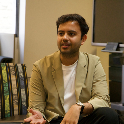 Prerit Pathak speaking to students at the INI