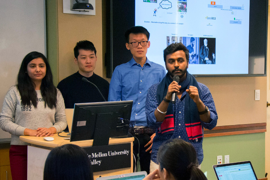 Classroom photo of students presenting Q&A section. Hassan Azmat, Kyle Caruso, Rishabh Banga