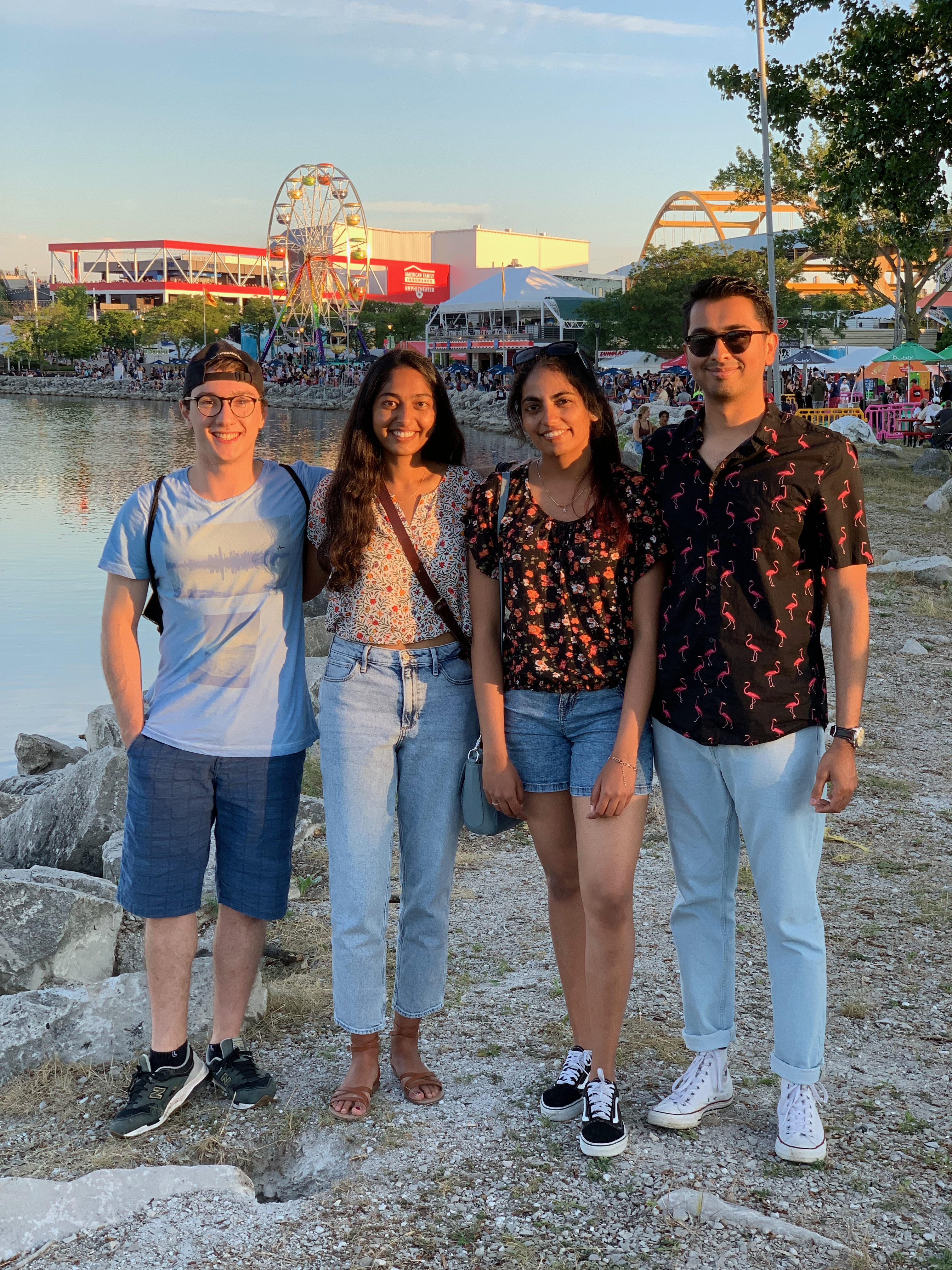 student manas mahaddalkar and fellow interns pose at a festival in Milwaukee