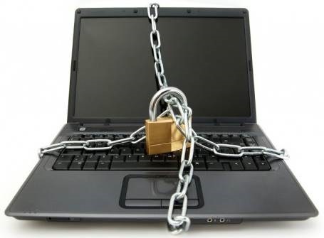Picture of a Laptop with a lock and chain around it