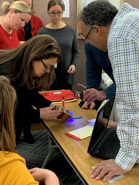 Individuals attempt to solve the clues to hack into the computer