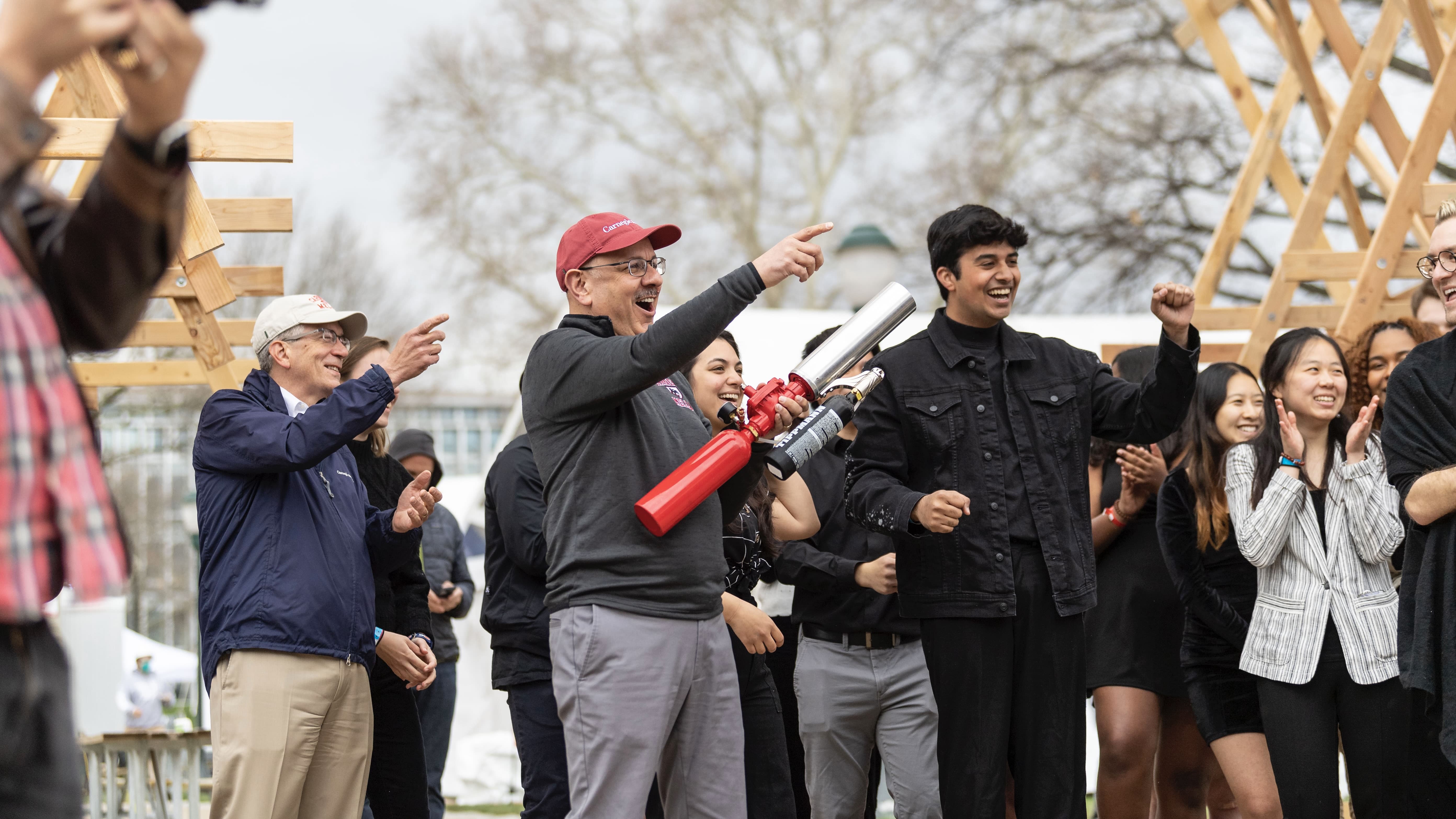 Farnam Jahanian joins students and leaders during Carnegie Mellon's 2022 Spring Carnival opening ceremonies