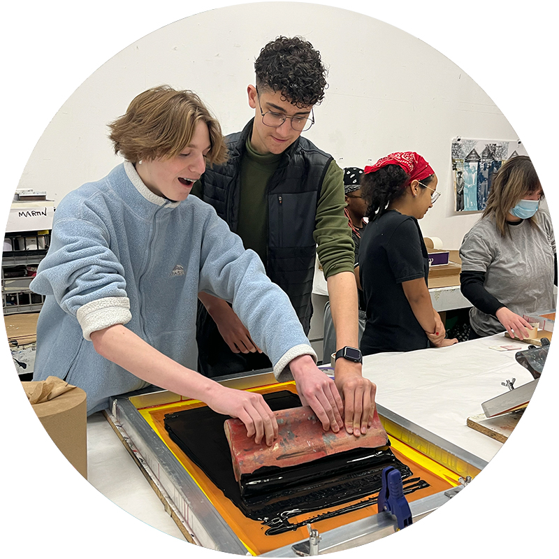 LEAP students screen printing posters for the National Opera House at Artists Image Resource.