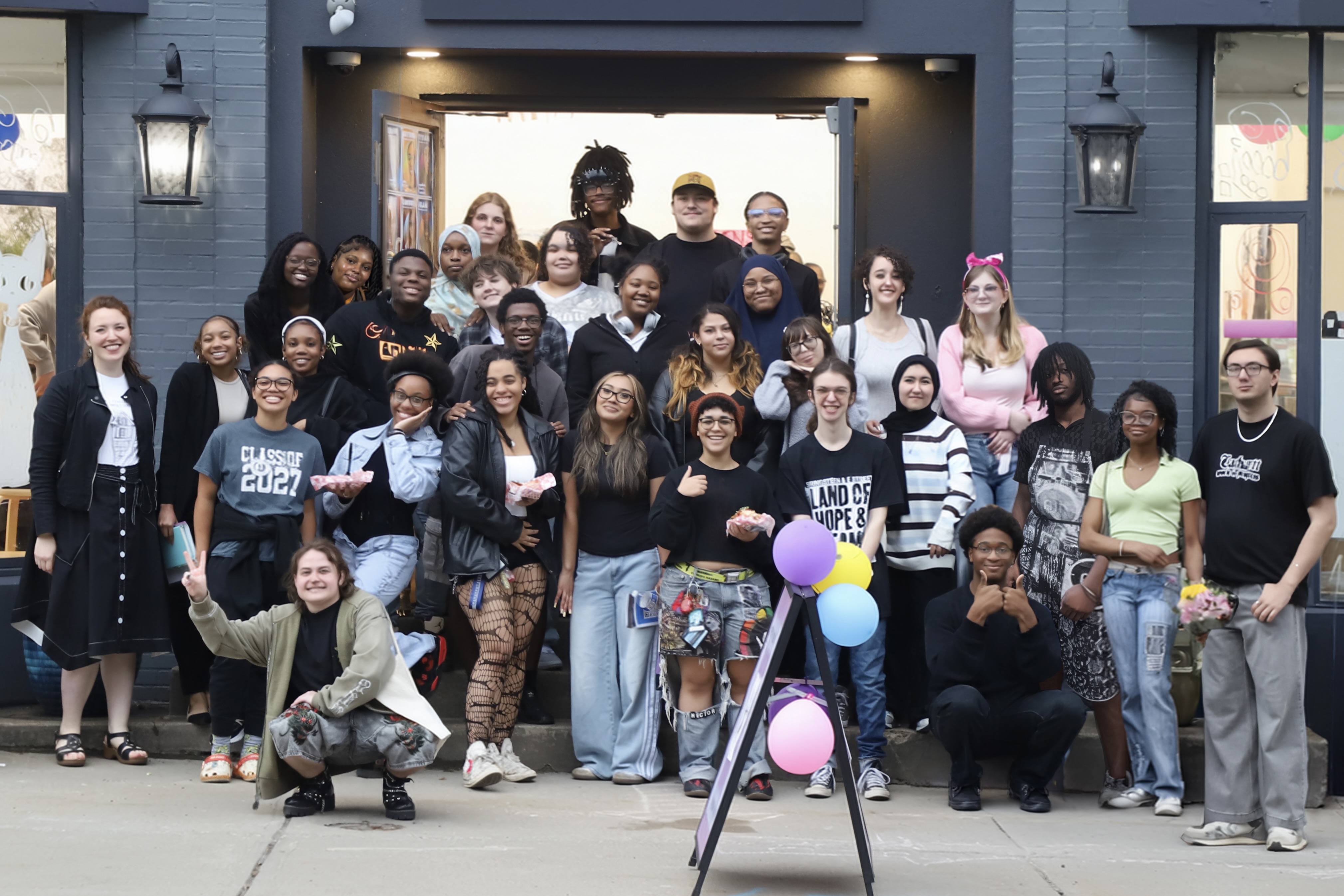 The 2025-2026 LEAP Cohort standing outside of The Frame Gallery.