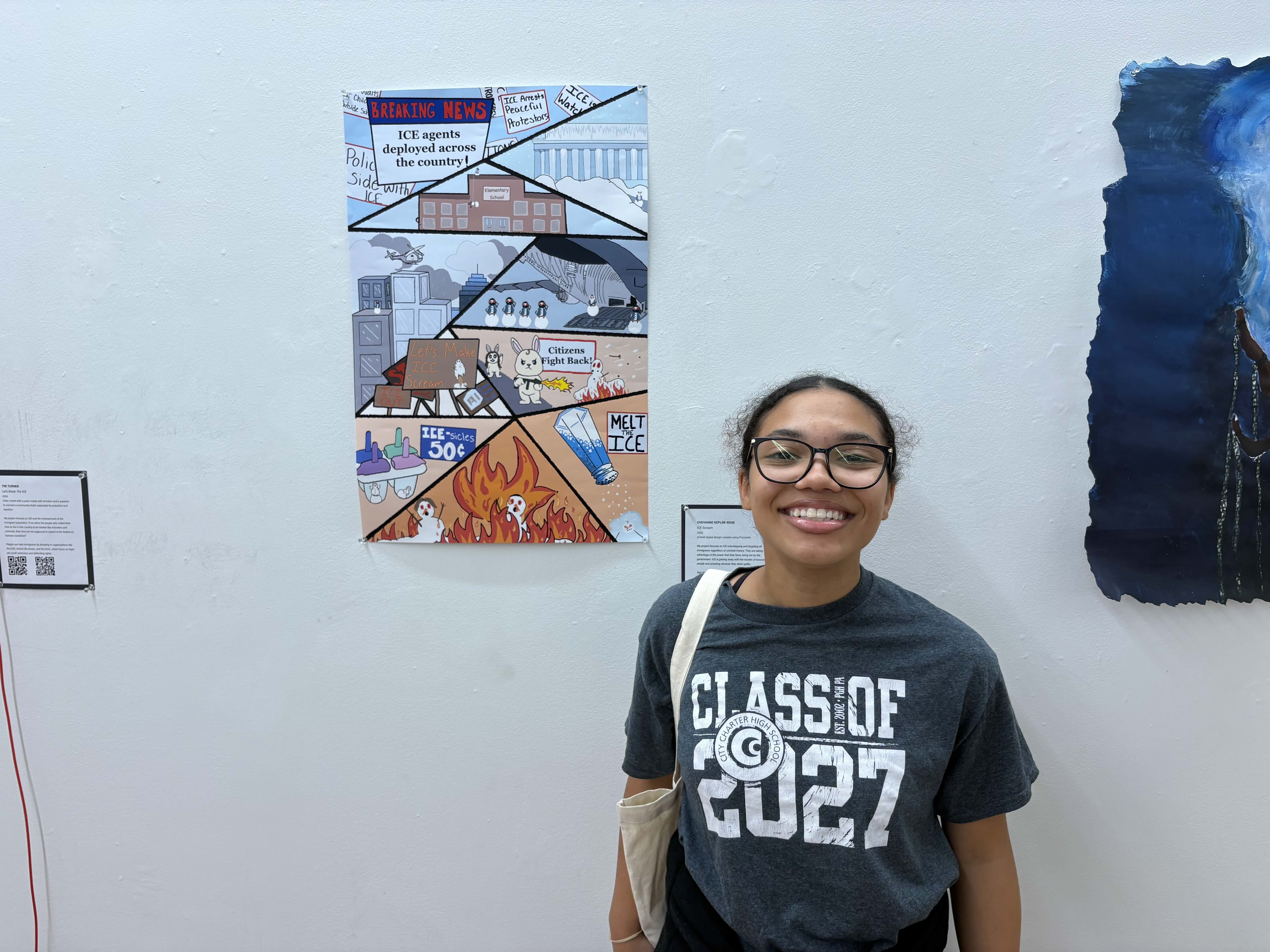 Student smiling in front of a printed poster with a comic book layout.
