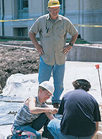 Lary Cartwright and the students working on a project