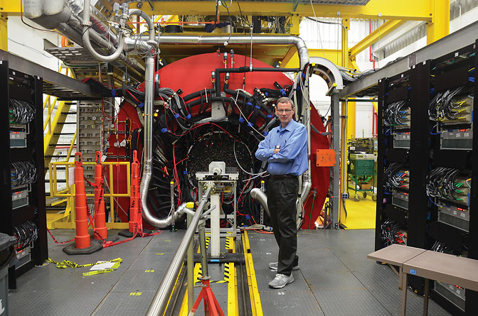 Curtis Meyer standing on the GlueX Platform