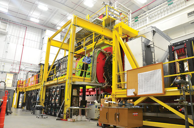 Curtis Meyer standing on the GlueX Platform