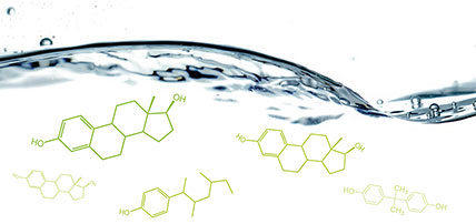 image of water with chemical symbols of pollutants