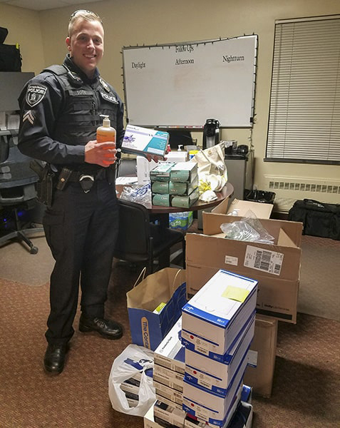 Officer accepts donations of PPE