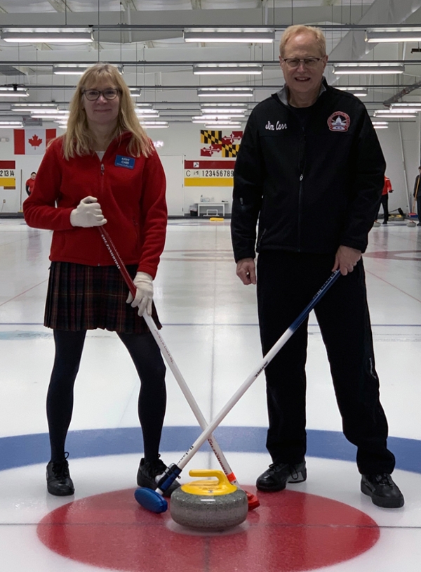 The Carrs curling on the ice