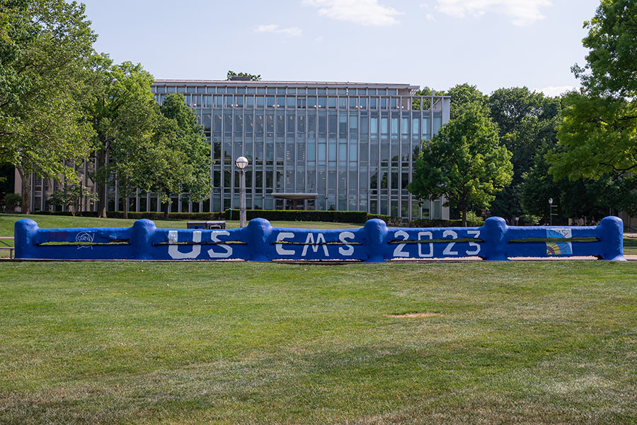 Fence painted to support CMS Meeting