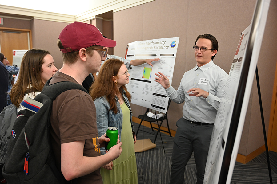 Ian Alcox presents his research at the SSP poster session