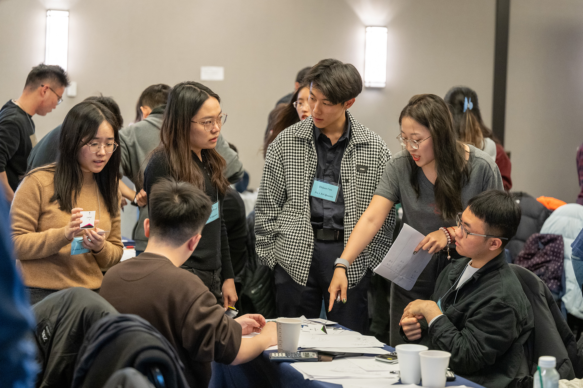 A group of students talks together