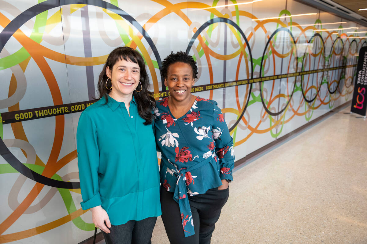 Elizabeth Chodos and artist Stephanie Dinkins in front of “Good Thoughts, Good Words, Good Deeds.”