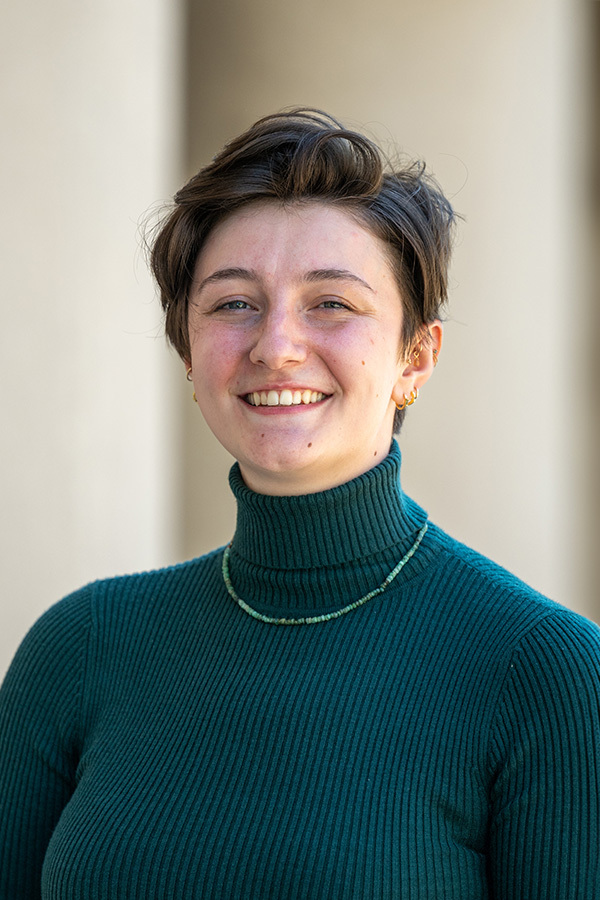 Mackenzie Riley stands outside of Mellon Institute