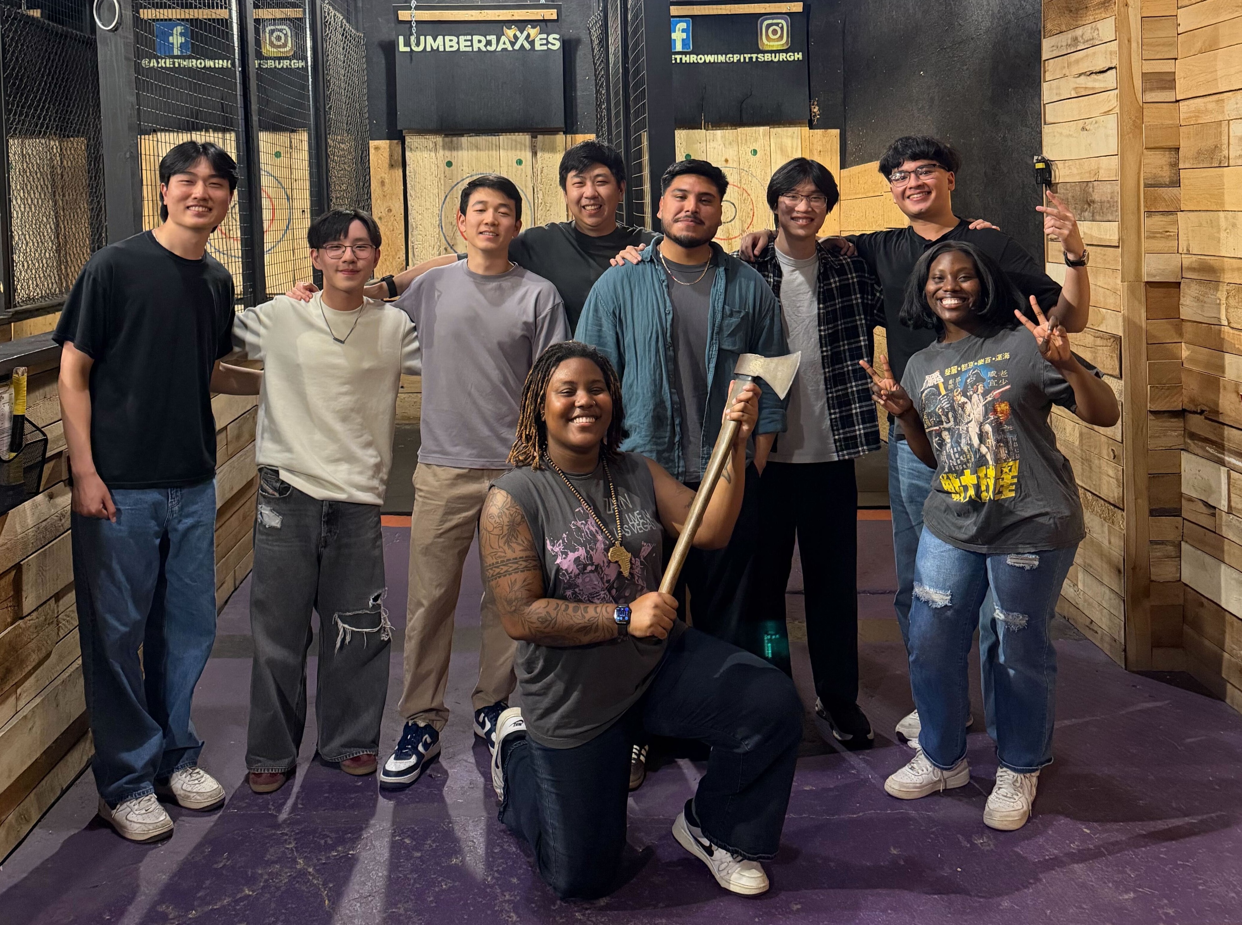Students at axe throwing venue