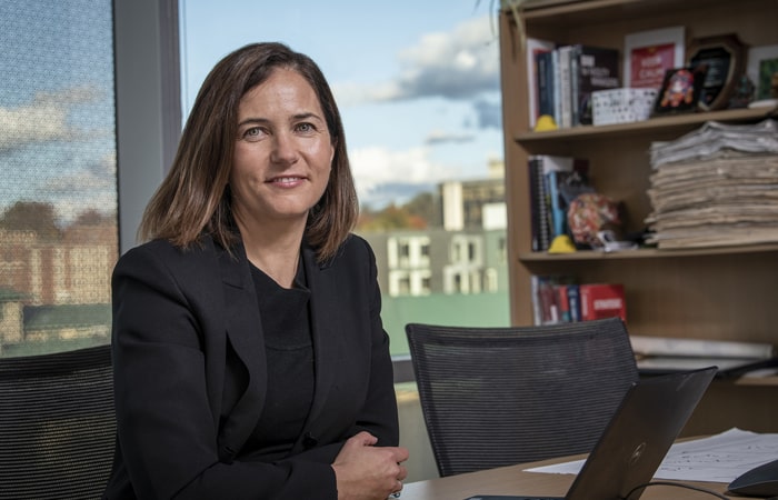 Burcu Akinci at her desk