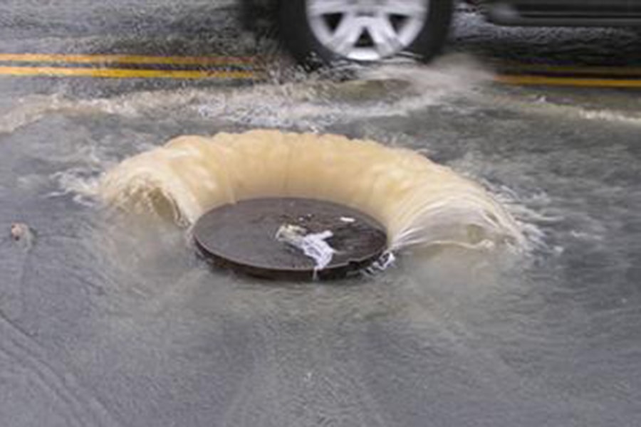 photo of storm drain overflowing