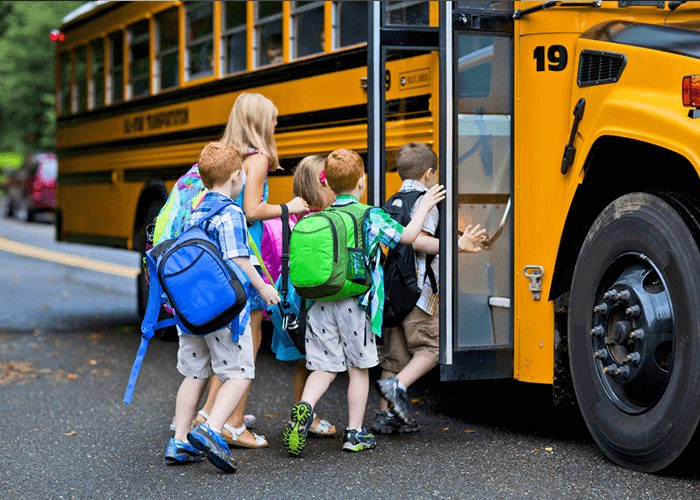 Kids Getting on a Bus