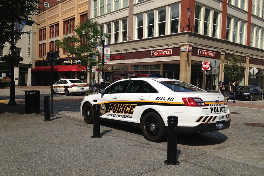 photo of Pittsburgh police cruisers in downtown Pittsburgh