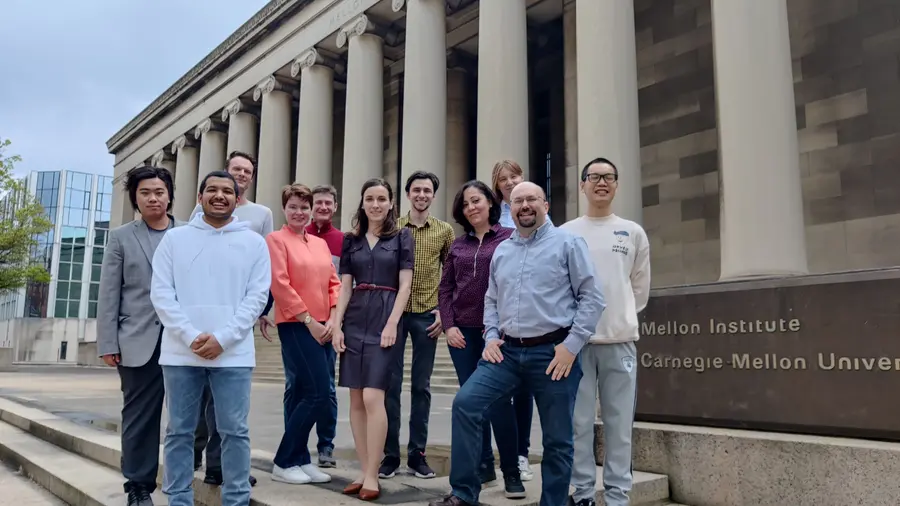Chemistry Associate Professory Olexandr Isayev (second from right) and his research group