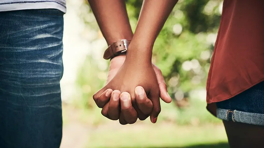 human-chain-hands-image-bj-900x600-min.jpg
