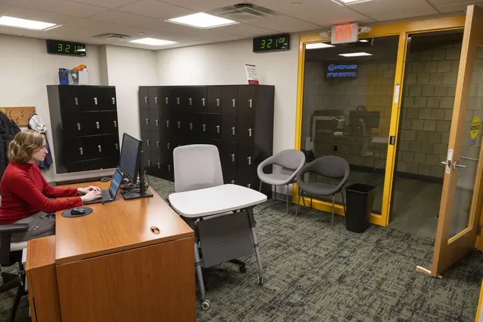 Entrance to new testing center showing lockers and front desk check-in