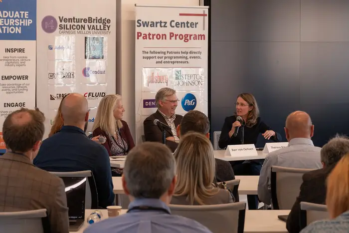 Theresa Mayer speaks on a panel