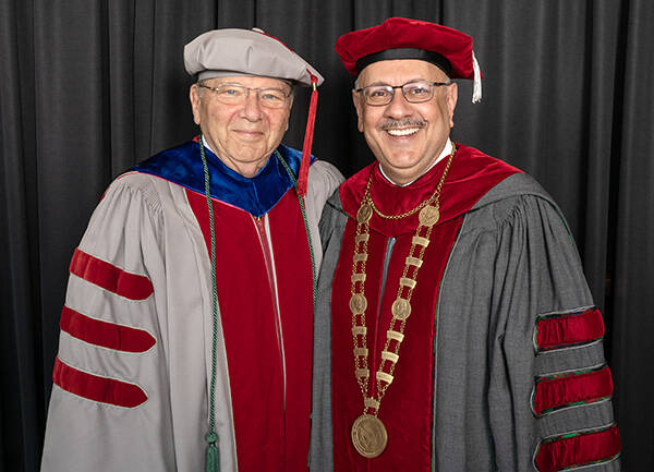 Jared Cohon and Farnam Jahanian at Commencement in 2022.